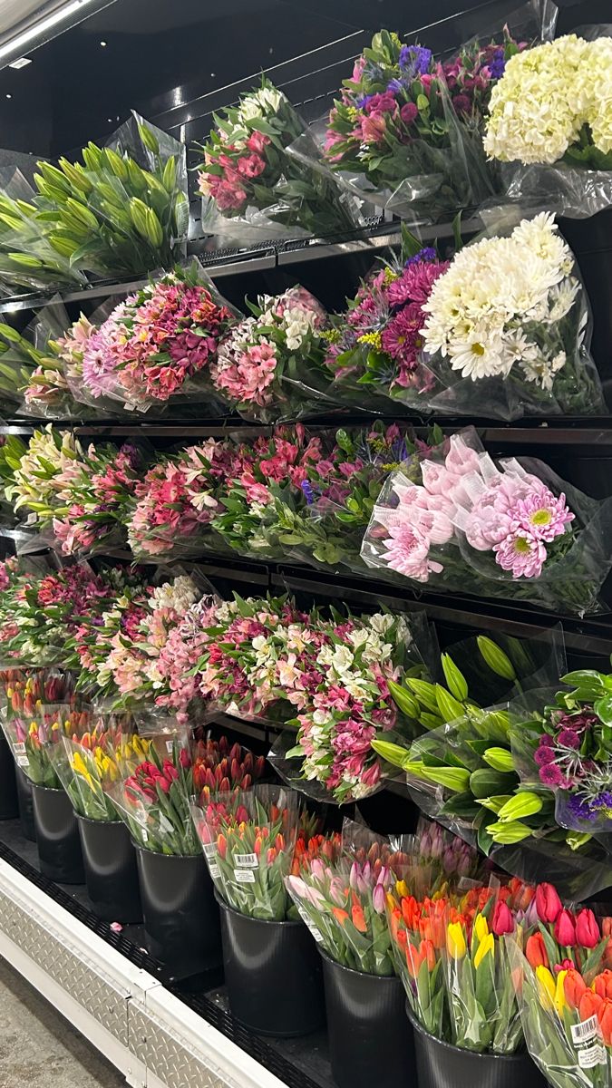 Open artisan kitchen floral stem rack and design area